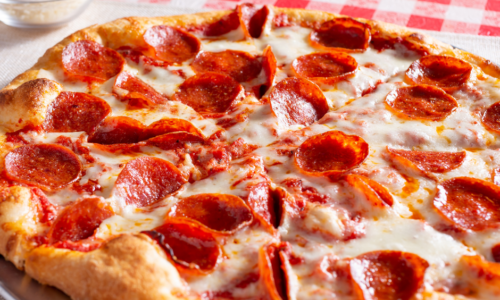 Pepperoni Pizza on a checkered table cloth