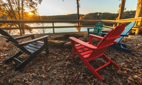 A firepit at Burr Oak overlooking a lake.