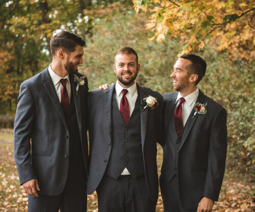 Smiling groomsmen