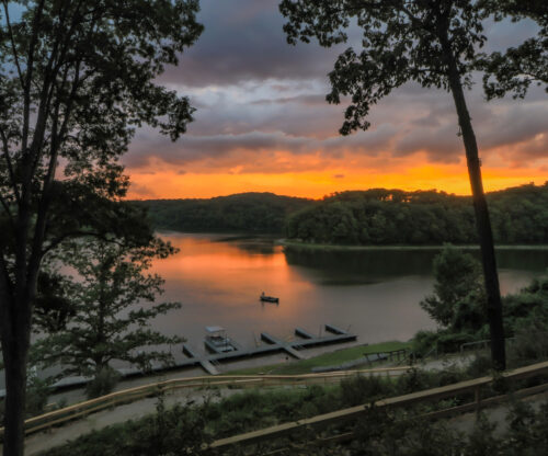 view of dock at sunset