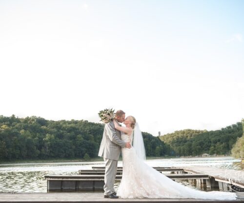 Bride and Groom in front of lake