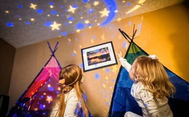 Two sisters enjoy glamping at Burr Oak State Park Lodge.